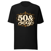 Black 50 & Sexy birthday T-shirt with white and gold vintage lettering and ornate decorative flourishes.