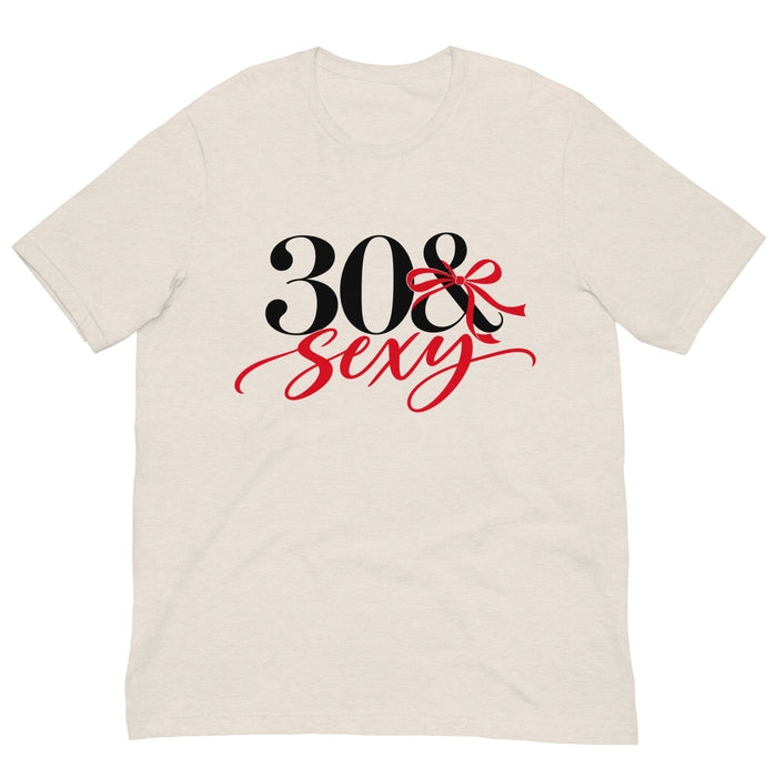 White 30 & Sexy birthday T-shirt featuring black numbers, a decorative red bow and red cursive lettering.